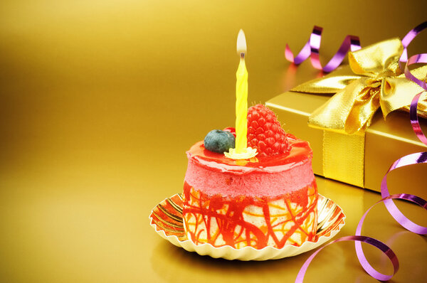 Colorful birthday cake with candle — Stock Photo, Image