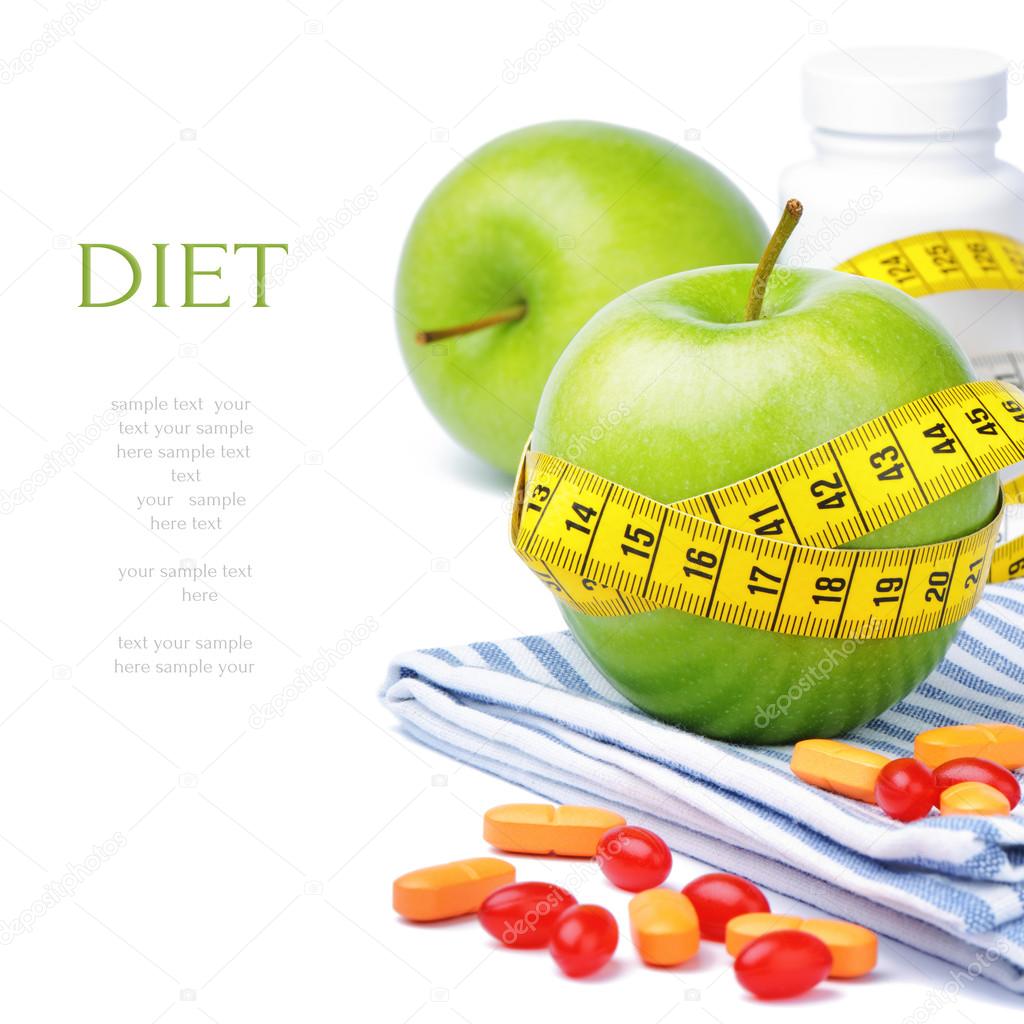 Green apples, vitamins and measuring tape Stock Photo by ©paulgrecaud 12677521