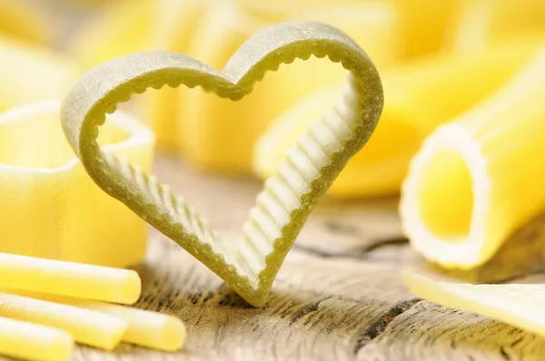 Raw heart shaped pasta — Stock Photo, Image