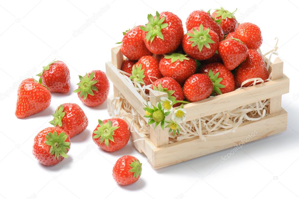 Small wooden crate with strawberries