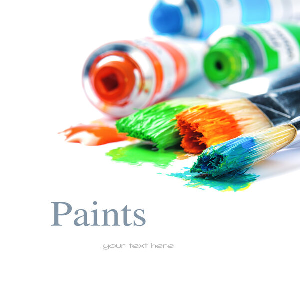 Colorful paints and artist brushes