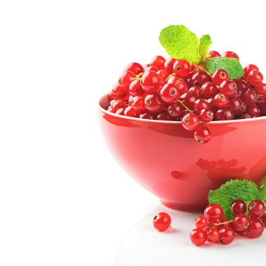 Organic red currant in a bowl clipart