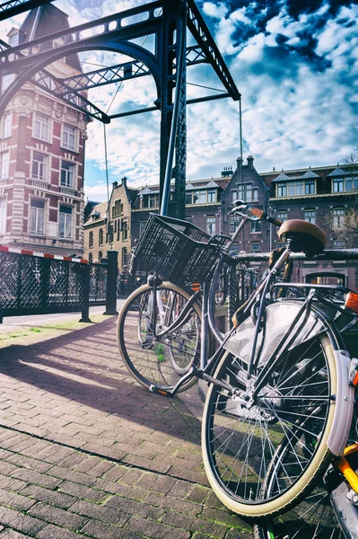 Old bicycle on bridge. — Stock Photo, Image