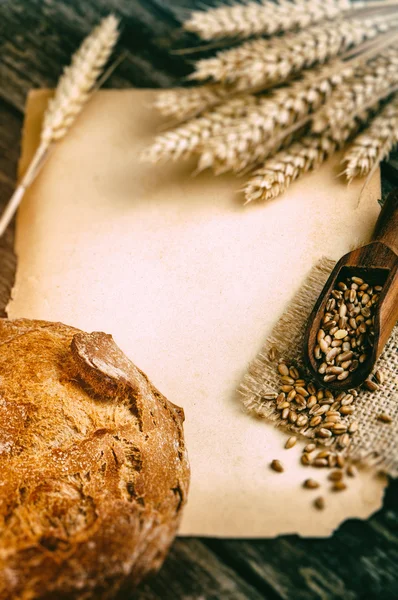 Quadro agrícola com pão e trigo — Fotografia de Stock