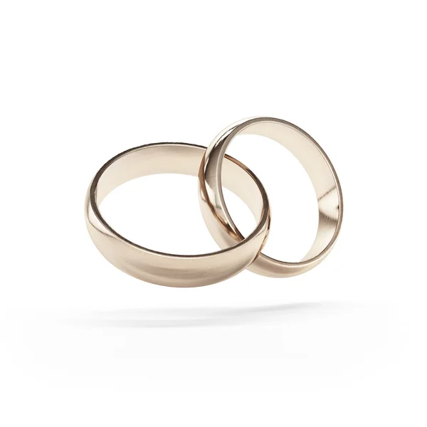 Anéis de casamento de ouro ligados — Fotografia de Stock