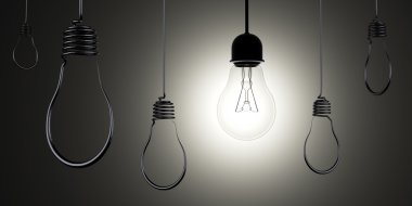 parlayan bir Işık Ampüller siluetleri asılı