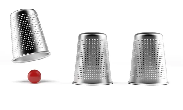 A shell game: three thimbles and a ball — Stock Photo, Image