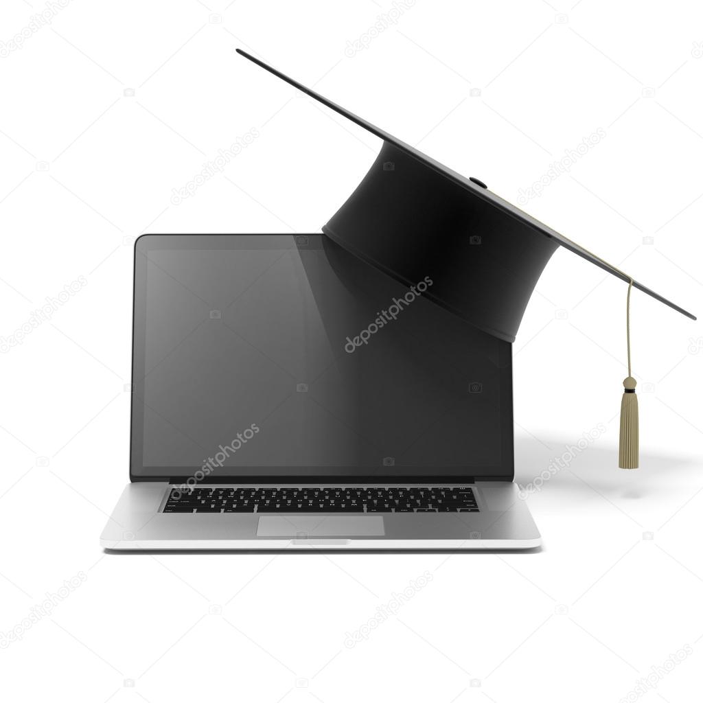 Grad hat and laptop