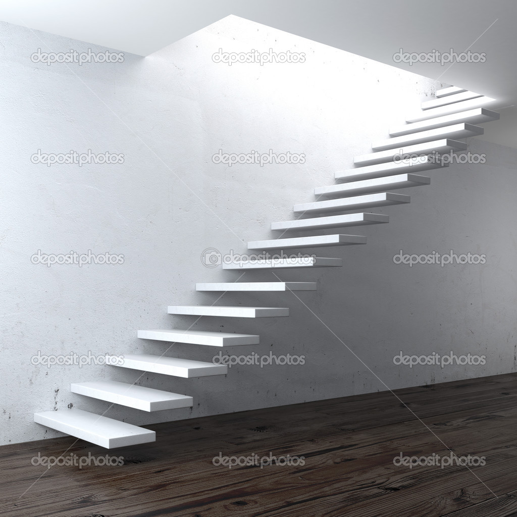 White concrete stair near a wall