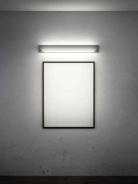Рамка на стене с лампой в темной комнате — стоковое фото