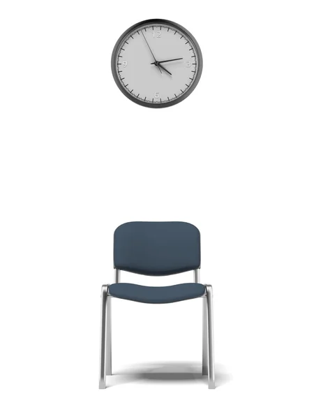 Wanduhr und Bürostuhl — Stockfoto