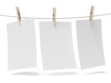 kağıt üzerinde bir ip clothespins ile