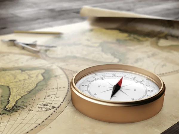 Vintage compass on an ancient world map