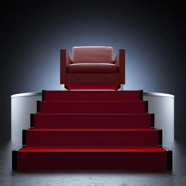 Chaise rouge et podium isolés sur noir — Photo