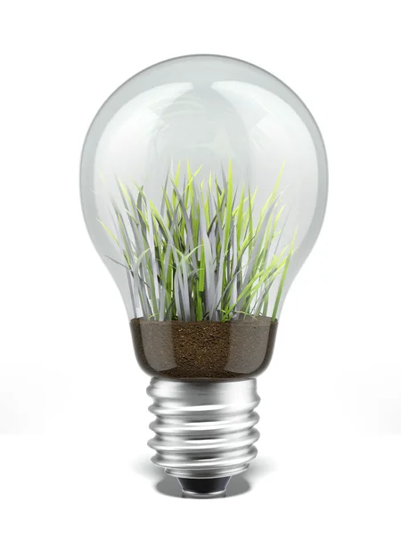 Лампочка с травой внутри — стоковое фото