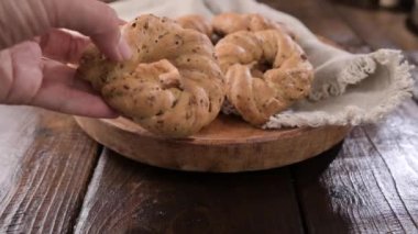 Taralli, a popular cheap snack, for sale in Naples, Italy. Neapolitan cookies called made with lard almond or black pepper. High quality 4k footage. for social networks and advertising
