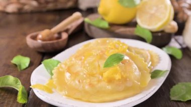 Seadas, traditional sardinian dessert with pecorino cheese, honey and lemon. Round meal with cheese, traditional in italy of the Sardinia region and south of italy. High quality 4k footage