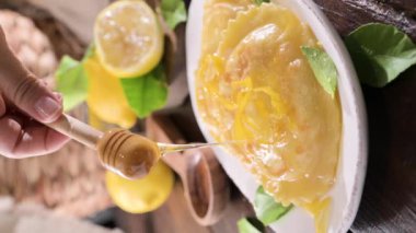 Seadas, traditional sardinian dessert with pecorino cheese, honey and lemon. Round meal with cheese, traditional in italy of the Sardinia region and south of italy. High quality 4k footage