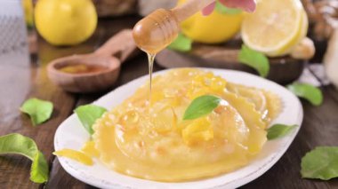 Seadas, traditional sardinian dessert with pecorino cheese, honey and lemon. Round meal with cheese, traditional in italy of the Sardinia region and south of italy. High quality 4k footage