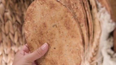 Spianata Sarda. Typical tortilla bread in italy Sardinia region. Baking bread Thin round with different flour. High quality 4k footage. Vertical video