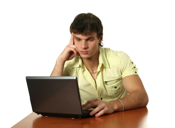 Junger sexy Mann mit Laptop — Stockfoto