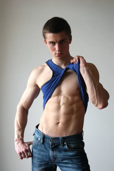 Sexy Young Man Showing His Abs — Stock Photo, Image