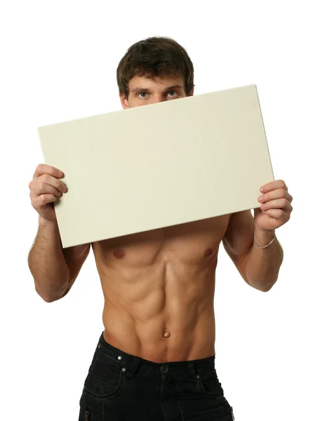 Jovem sexy homem com cópia espaço em branco bandeira — Fotografia de Stock