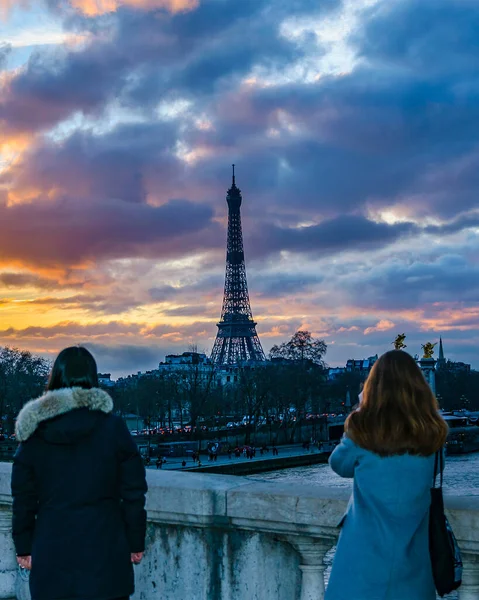Urban sunset scene of paris city with eiffel tower as main subject