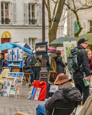 PARIS, FRANCE, JANUARY - 2020 - Winter day urban scene at famous artists tertre square, montmartre paris