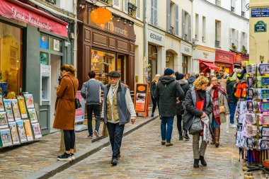 PARIS, FRANCE, JANUARY - 2020 - Winter day urban scene at famous artists street, montmartre paris