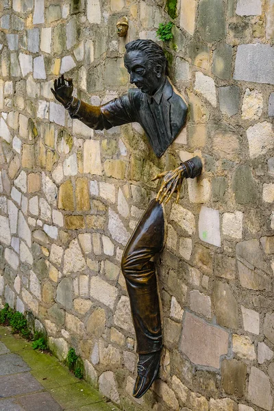 Funny man sculpture at montmartre district, paris, france