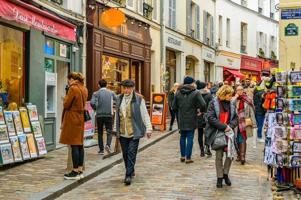 PARIS, FRANCE, JANUARY - 2020 - Winter day urban scene at famous artists street, montmartre paris