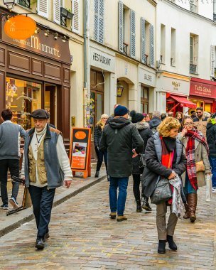 PARIS, FRANCE, JANUARY - 2020 - Winter day urban scene at famous artists street, montmartre paris