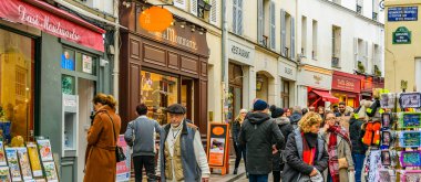 PARIS, FRANCE, JANUARY - 2020 - Winter day urban scene at famous artists street, montmartre paris