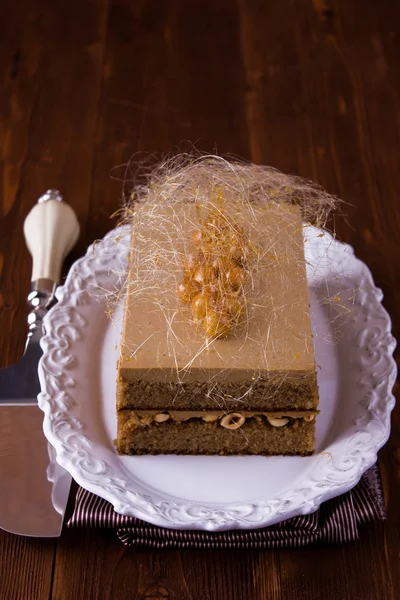 Coffee caramel cake with hazelnuts — Stock Photo, Image