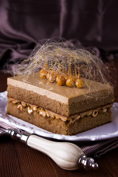 Coffee caramel cake with hazelnuts — Stock Photo, Image
