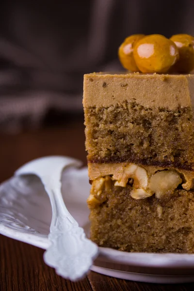 Coffee caramel cake with hazelnuts — Stock Photo, Image