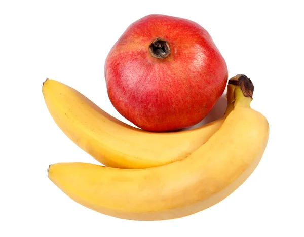 Bananas and pomegranate isolated on white