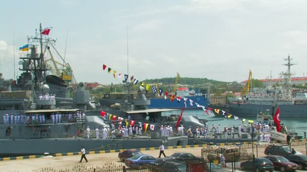Warship decorated with flags — Stock Video