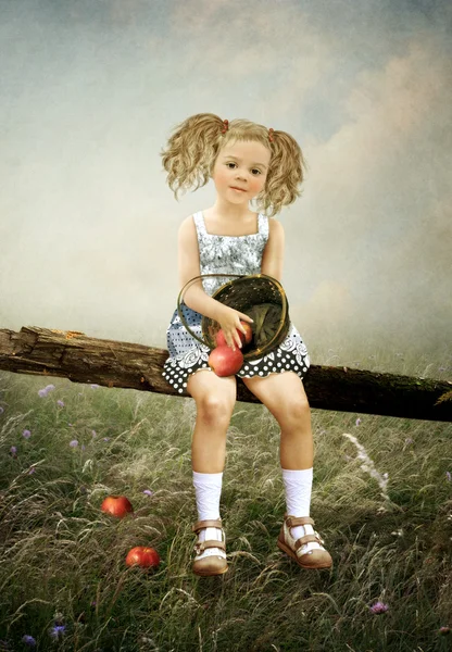 The girl with apples Royalty Free Stock Photos