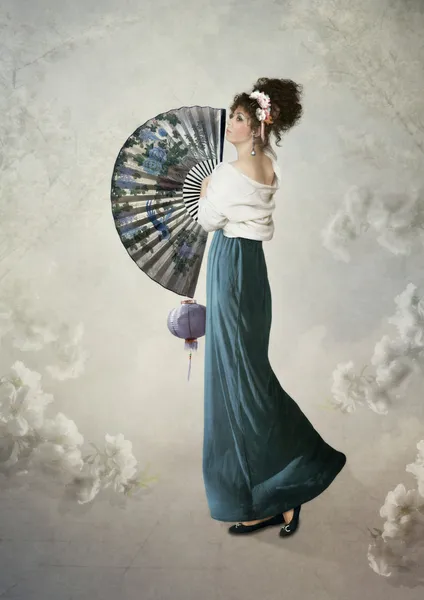 Young girl with fan — Stock Photo, Image