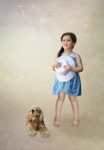 Girl with dog and kite — Stock Photo, Image