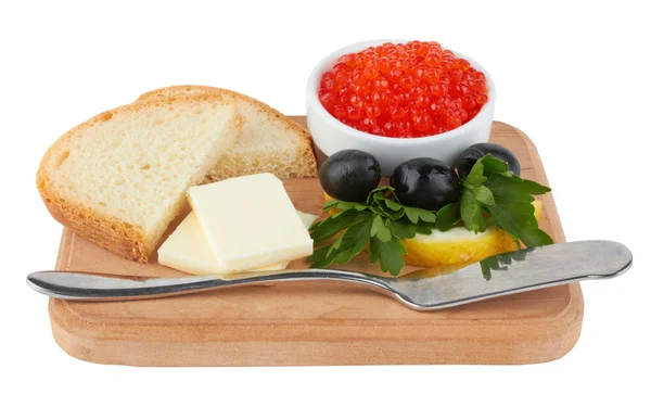 Caviar servido, con mantequilla y tostadas —  Fotos de Stock