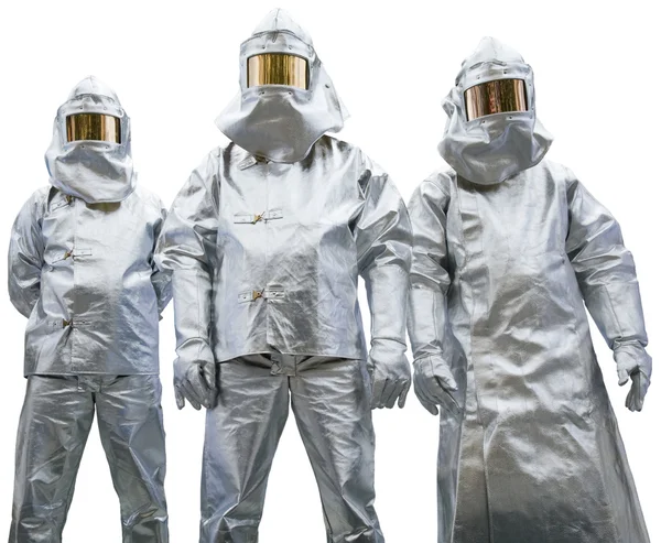 Three workers in protective clothing — Stock Photo, Image