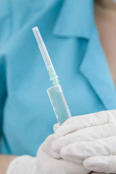 Syringe with a vaccine — Stock Photo, Image