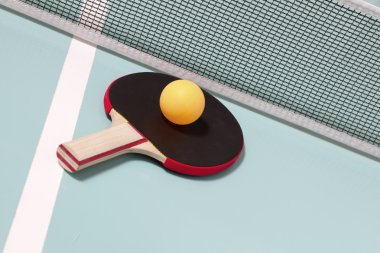 Table tennis racket and ball clipart