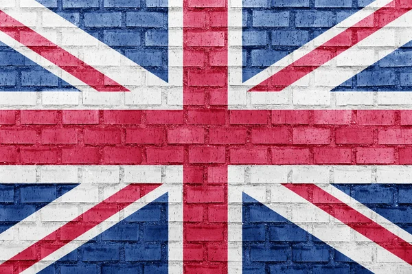 Flagge des Vereinigten Königreichs (UK) auf einer Ziegelmauer Stockbild
