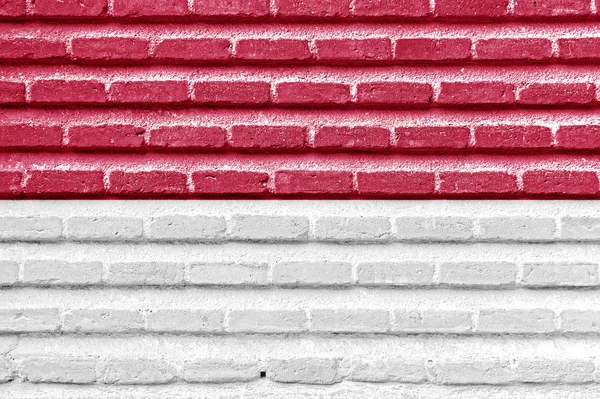 Vlajka Indonésie na starou cihlovou zeď — Stock fotografie