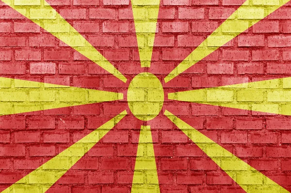 Vlajka Makedonie na cihlovou zeď — Stock fotografie