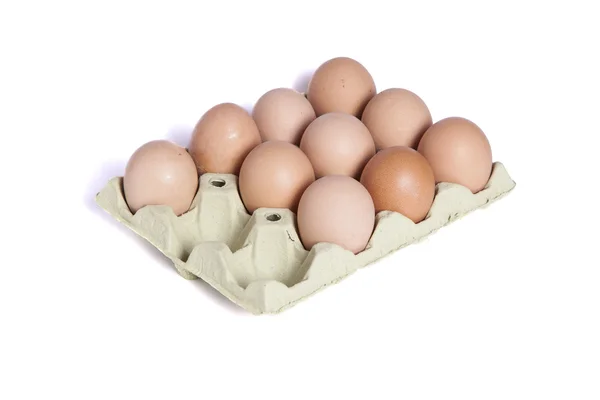 Dez ovos em uma dúzia de ovos de cartão — Fotografia de Stock